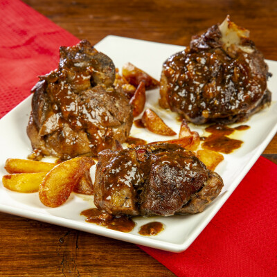 Agnello con pancetta